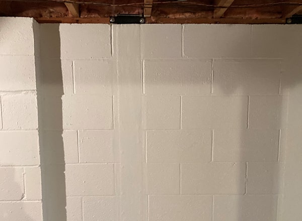 basement wall with white paint